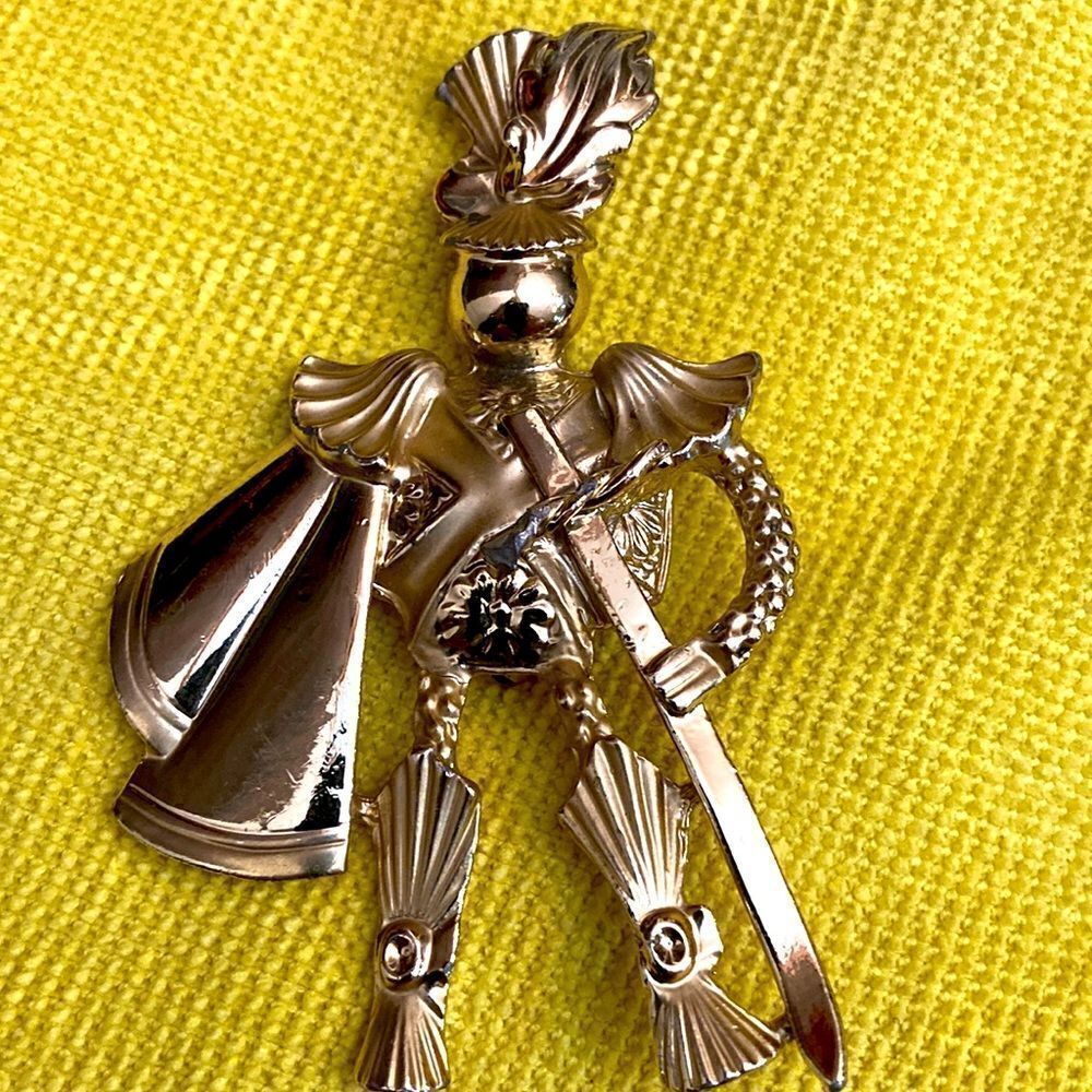 AJC vintage armor brooch 
